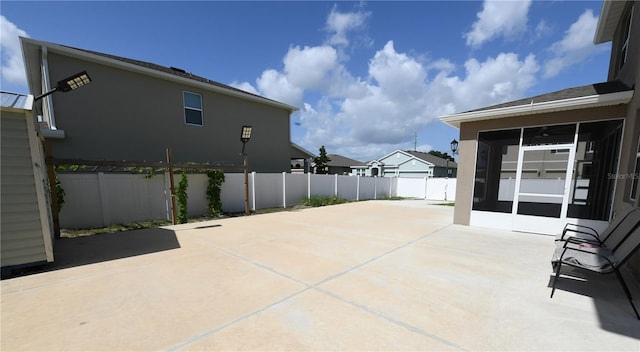 5962 SW 80th Ln, Ocala, FL 34476 - view of patio with a sunroom and a residential view