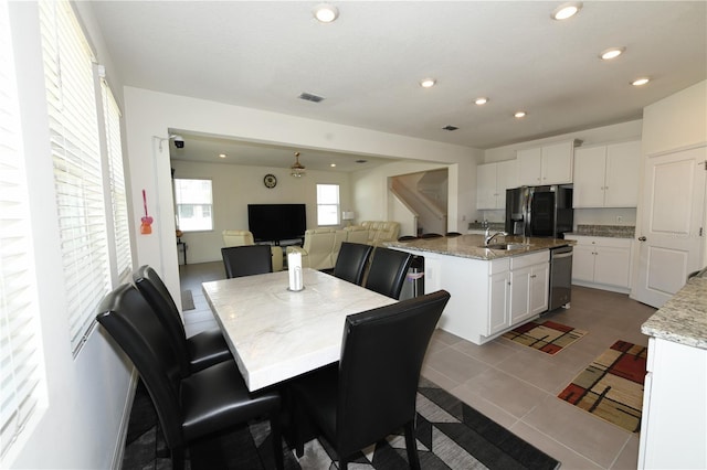 5962 SW 80th Ln, Ocala, FL 34476 - dining space with recessed lighting, tile patterned floors, and stairway
