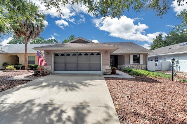 9069 SW 91st Cir, Ocala, FL 34481 - ranch-style house featuring stone siding, an attached garage, concrete driveway, and roof with shingles