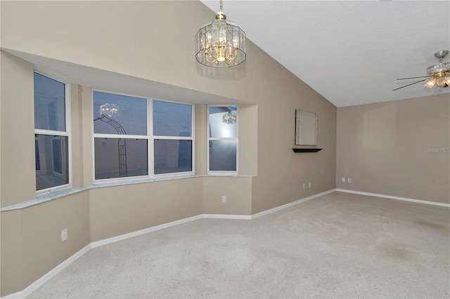 9069 SW 91st Cir, Ocala, FL 34481 - empty room featuring a chandelier, vaulted ceiling, carpet, and ceiling fan
