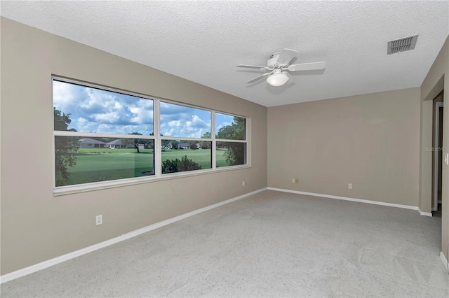 9069 SW 91st Cir, Ocala, FL 34481 - carpeted empty room with a ceiling fan and a textured ceiling