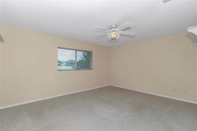 9069 SW 91st Cir, Ocala, FL 34481 - spare room featuring a ceiling fan, carpet flooring, and a textured ceiling