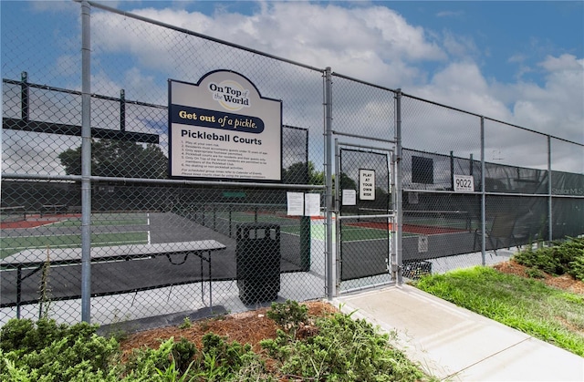9069 SW 91st Cir, Ocala, FL 34481 - view of tennis court featuring a gate