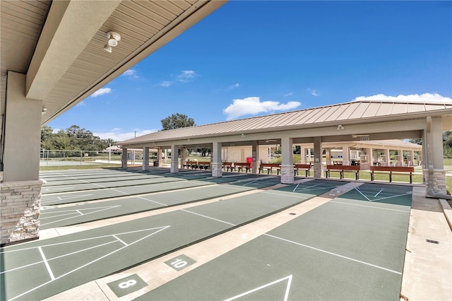 9069 SW 91st Cir, Ocala, FL 34481 - view of property's community featuring shuffleboard and covered parking