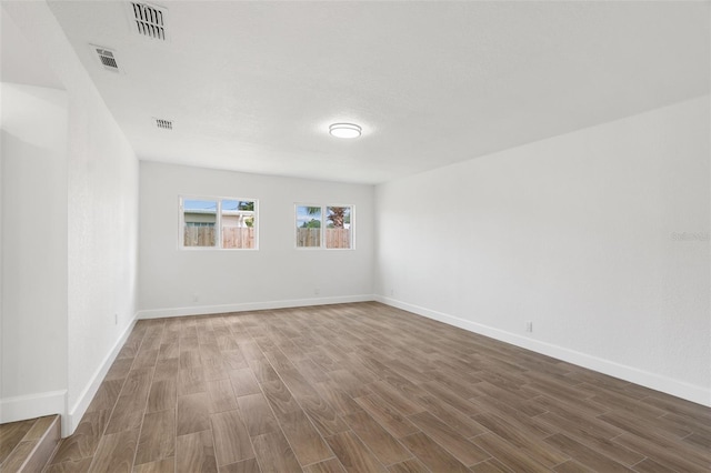 2817 Rheims Ave, Melbourne, FL 32935 - unfurnished room with wood finished floors and baseboards