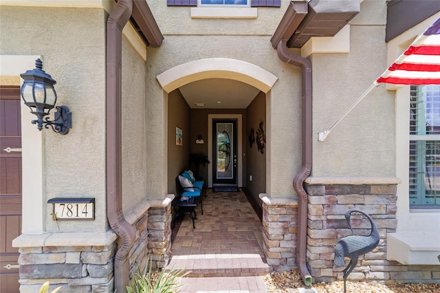 7814 SW 97th Cir, Ocala, FL 34481 - property entrance featuring stucco siding and stone siding