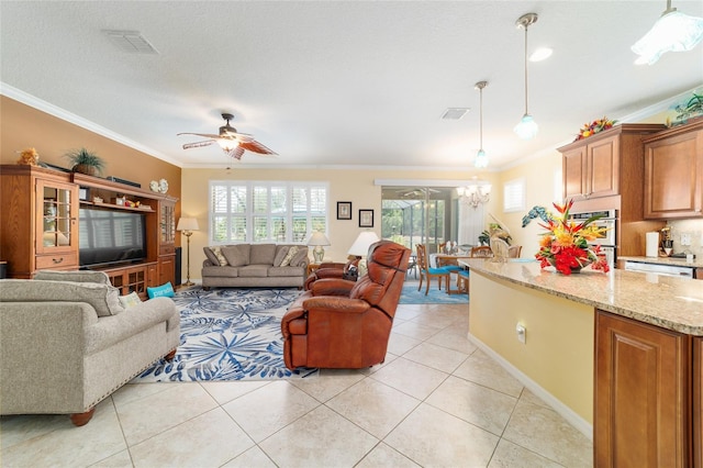7814 SW 97th Cir, Ocala, FL 34481 - living area with crown molding, light tile patterned floors, a chandelier, and a ceiling fan