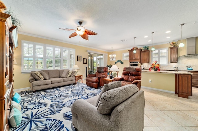 7814 SW 97th Cir, Ocala, FL 34481 - living area featuring ceiling fan, crown molding, recessed lighting, light tile patterned floors, and a chandelier