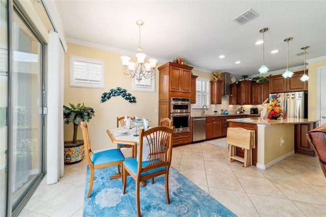 7814 SW 97th Cir, Ocala, FL 34481 - kitchen with appliances with stainless steel finishes, ornamental molding, backsplash, a chandelier, and a kitchen bar