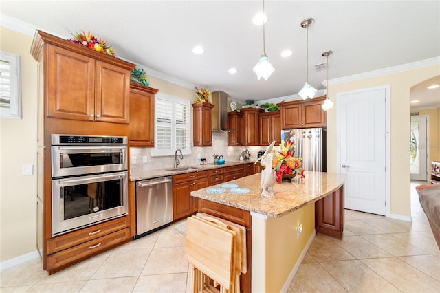 7814 SW 97th Cir, Ocala, FL 34481 - kitchen with appliances with stainless steel finishes, ornamental molding, wall chimney exhaust hood, light tile patterned flooring, and arched walkways