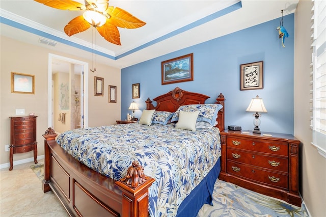 7814 SW 97th Cir, Ocala, FL 34481 - bedroom featuring a raised ceiling, ceiling fan, and light tile patterned floors
