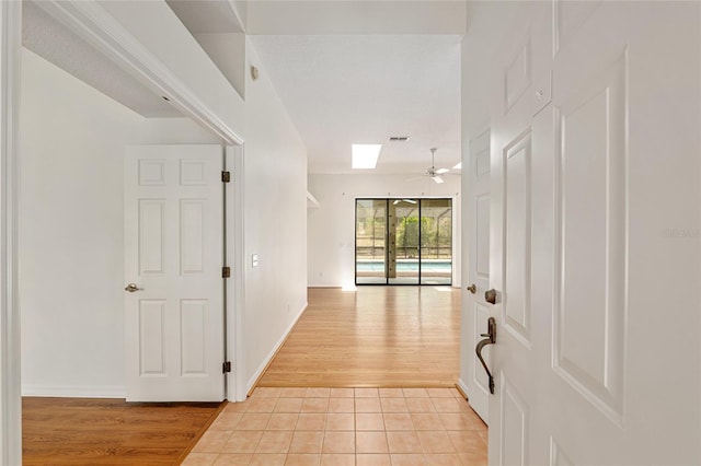 9180 SW 202nd Avenue Rd, Dunnellon, FL 34431 - hall with light wood-style flooring and baseboards
