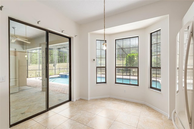 9180 SW 202nd Avenue Rd, Dunnellon, FL 34431 - doorway featuring a ceiling fan and light tile patterned floors