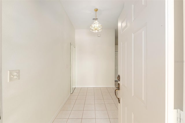 9180 SW 202nd Avenue Rd, Dunnellon, FL 34431 - corridor featuring light tile patterned floors and baseboards