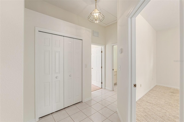 9180 SW 202nd Avenue Rd, Dunnellon, FL 34431 - corridor with light tile patterned flooring and baseboards