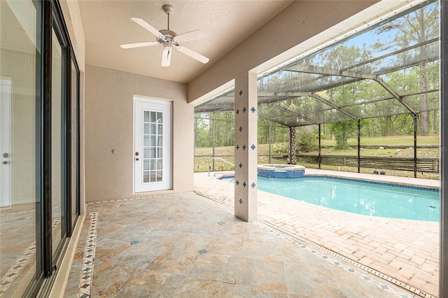 9180 SW 202nd Avenue Rd, Dunnellon, FL 34431 - view of pool with a patio, a ceiling fan, glass enclosure, and a pool with connected hot tub