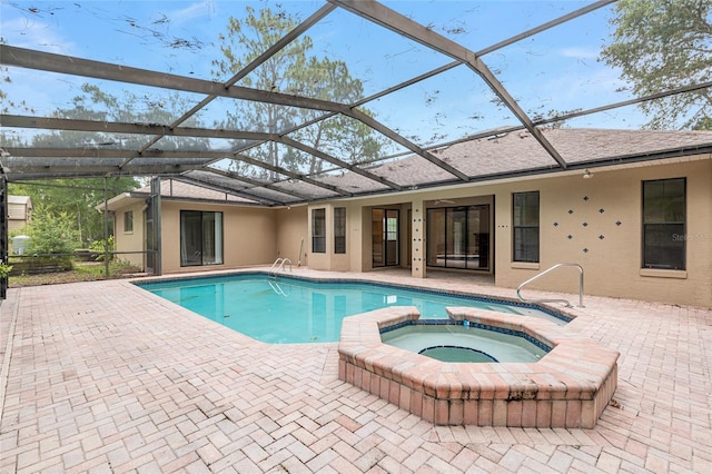 9180 SW 202nd Avenue Rd, Dunnellon, FL 34431 - view of swimming pool with a patio area, a lanai, and a pool with connected hot tub