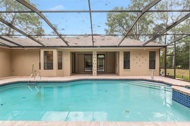 9180 SW 202nd Avenue Rd, Dunnellon, FL 34431 - swimming pool featuring a patio area and glass enclosure