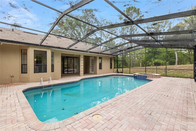 9180 SW 202nd Avenue Rd, Dunnellon, FL 34431 - view of pool featuring a patio, a pool with connected hot tub, and a lanai