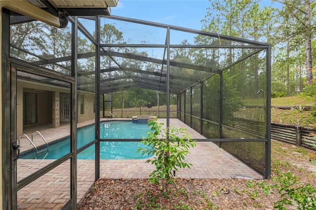 9180 SW 202nd Avenue Rd, Dunnellon, FL 34431 - view of pool with a patio area, a pool with connected hot tub, and a lanai