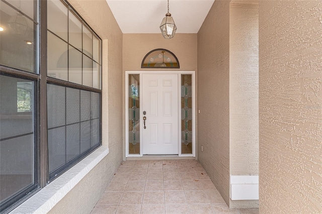 9180 SW 202nd Avenue Rd, Dunnellon, FL 34431 - doorway to property featuring stucco siding