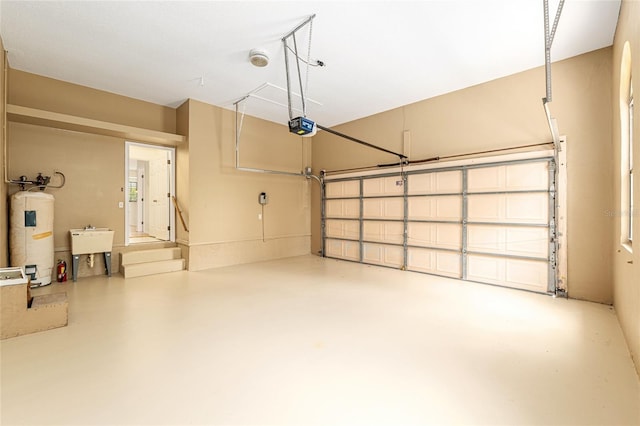 9180 SW 202nd Avenue Rd, Dunnellon, FL 34431 - garage with electric water heater and a garage door opener