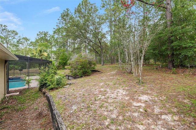 9180 SW 202nd Avenue Rd, Dunnellon, FL 34431 - view of yard with glass enclosure