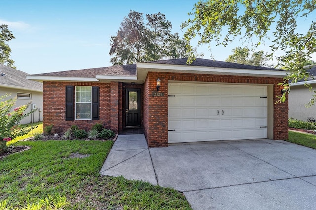 2127 NE 38th Ter, Ocala, FL 34470 - ranch-style home with brick siding, concrete driveway, and an attached garage