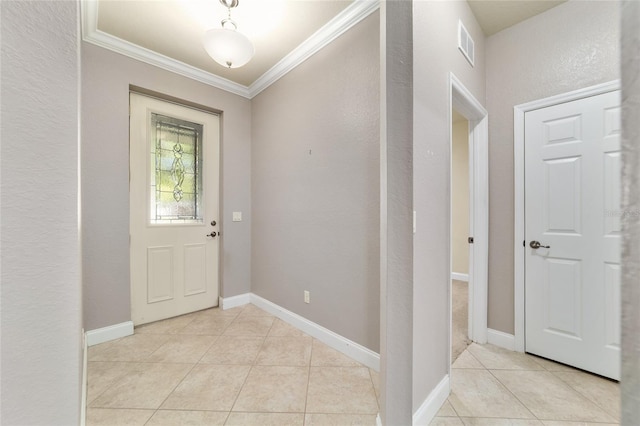 2127 NE 38th Ter, Ocala, FL 34470 - foyer entrance with light tile patterned flooring, ornamental molding, and a textured wall