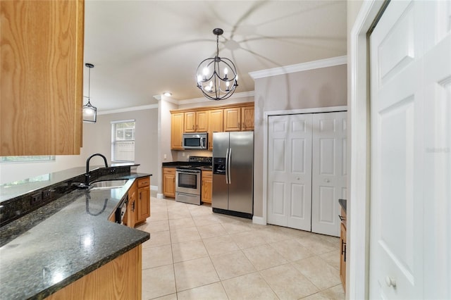 2127 NE 38th Ter, Ocala, FL 34470 - kitchen featuring stainless steel appliances, ornamental molding, a chandelier, light tile patterned floors, and decorative light fixtures