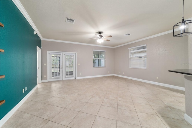 2127 NE 38th Ter, Ocala, FL 34470 - unfurnished living room with ornamental molding, ceiling fan, light tile patterned flooring, and french doors