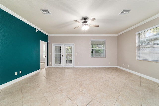 2127 NE 38th Ter, Ocala, FL 34470 - empty room featuring ornamental molding, a ceiling fan, french doors, and light tile patterned floors