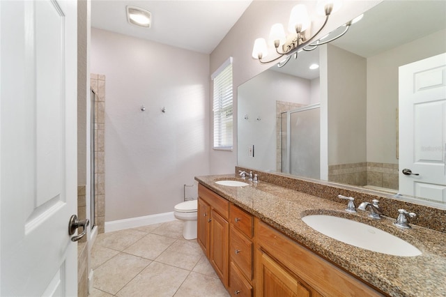 2127 NE 38th Ter, Ocala, FL 34470 - bathroom featuring a stall shower, double vanity, tile patterned floors, and a chandelier