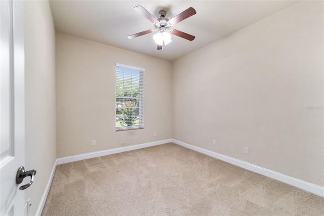 2127 NE 38th Ter, Ocala, FL 34470 - spare room featuring light colored carpet and ceiling fan
