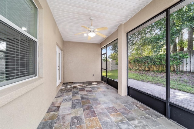 2127 NE 38th Ter, Ocala, FL 34470 - unfurnished sunroom with a ceiling fan
