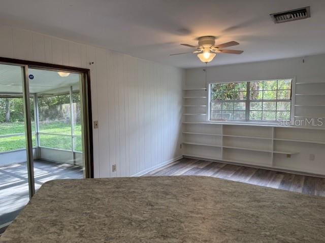 4701 NE 9th St, Ocala, FL 34470 - empty room featuring wood finished floors and ceiling fan