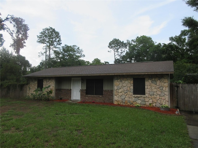 6141 NW 64th Ct, Ocala, FL 34482 - single story home featuring stone siding, roof with shingles, and brick siding