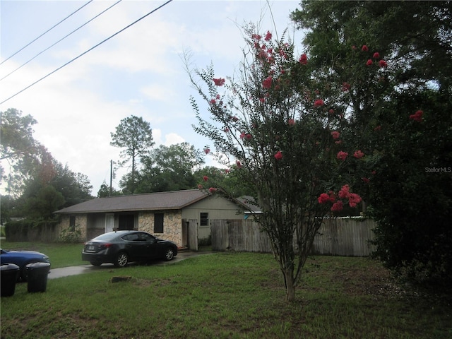 6141 NW 64th Ct, Ocala, FL 34482 - view of front facade featuring stone siding
