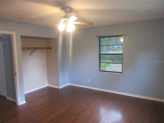 6141 NW 64th Ct, Ocala, FL 34482 - unfurnished bedroom with wood finished floors, a textured ceiling, and ceiling fan