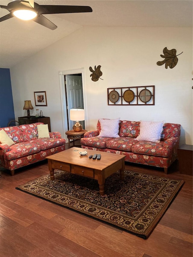 8450 SW 90th St Unit D, Ocala, FL 34481 - living area featuring vaulted ceiling, wood finished floors, and a ceiling fan