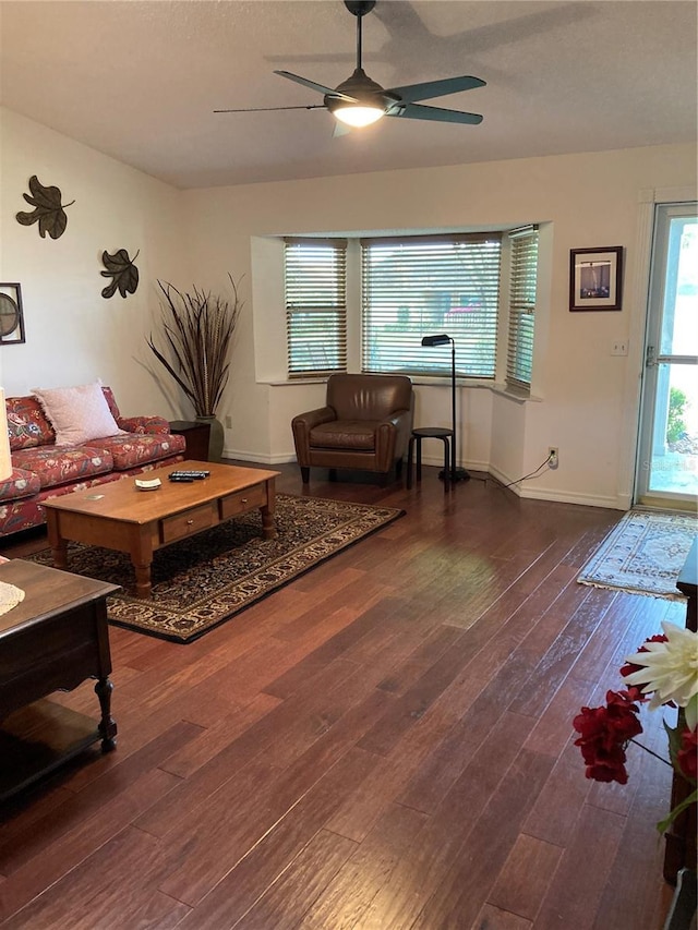 8450 SW 90th St Unit D, Ocala, FL 34481 - living room featuring ceiling fan and wood finished floors