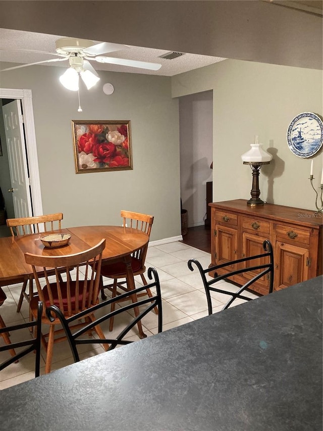 8450 SW 90th St Unit D, Ocala, FL 34481 - dining area featuring a ceiling fan and light tile patterned floors