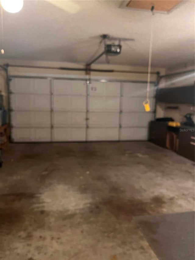 8450 SW 90th St Unit D, Ocala, FL 34481 - garage with a garage door opener