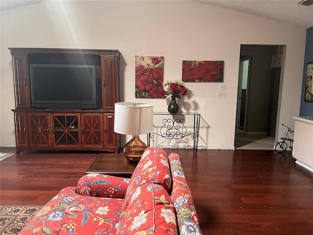 8450 SW 90th St Unit D, Ocala, FL 34481 - living room featuring vaulted ceiling and wood finished floors