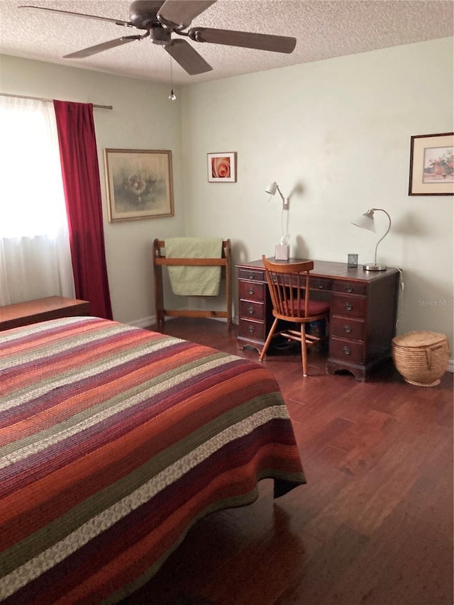 8450 SW 90th St Unit D, Ocala, FL 34481 - bedroom featuring a textured ceiling, wood finished floors, and a ceiling fan