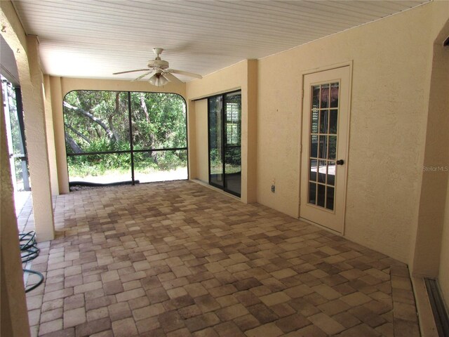 4622 N Pink Poppy Dr, Beverly Hills, FL 34465 - unfurnished sunroom with brick patterned flooring