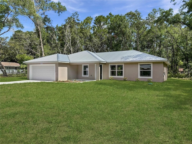 3679 E Bernice St, Inverness, FL 34453 - ranch-style house with an attached garage, stucco siding, a front lawn, and a metal roof