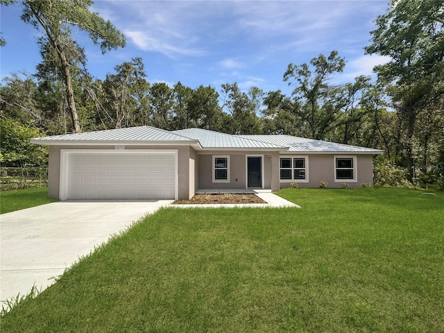 3679 E Bernice St, Inverness, FL 34453 - single story home with stucco siding, an attached garage, driveway, and a front lawn