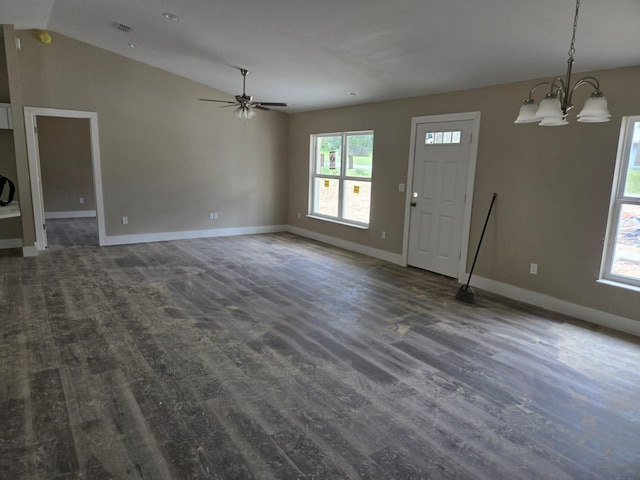 11139 N Sonnet Ter, Citrus Springs, FL 34433 - unfurnished living room featuring a chandelier, dark wood-style flooring, vaulted ceiling, and ceiling fan