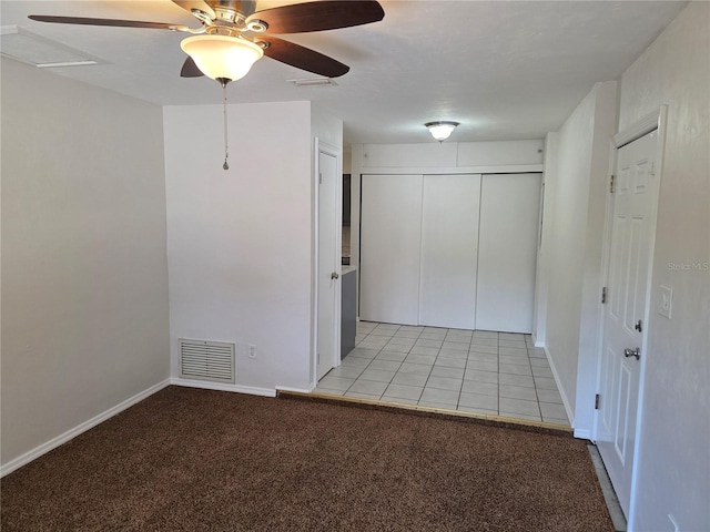 315 NE 2nd Ave, Williston, FL 32696 - spare room with a ceiling fan and light colored carpet